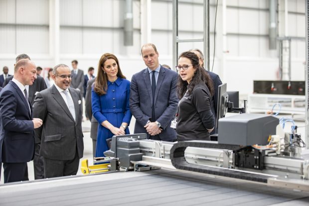 The Duke and Duchess of Cambridge view a piece of machinery